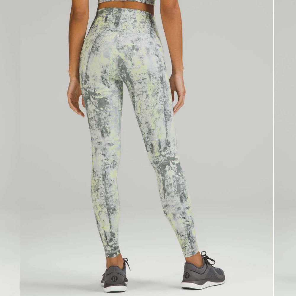 Lululemon Wunder Train High-Rise Tight 25"
Green Gray size 4